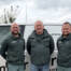 Daniel Veng, Peter Veng og Steffan Veng foran en varevogn fra Tømrergården
